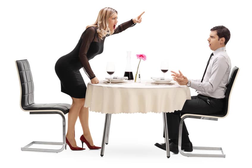 The woman scolding her partner while they are on a date