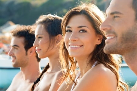 group of friends enjoying the beach