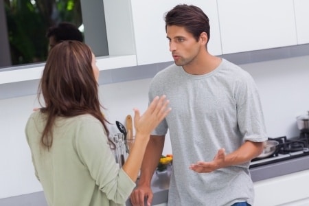 couple arguing in the kitchen