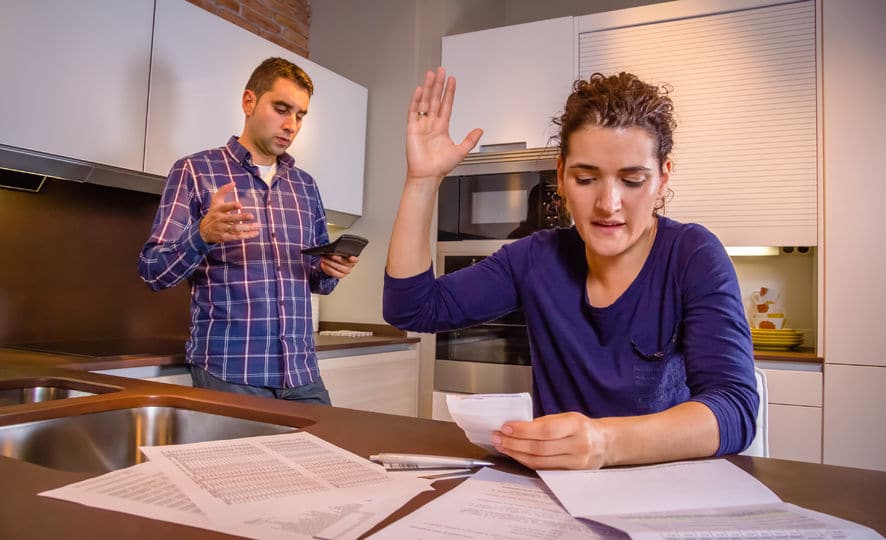 woman resenting her boyfriend for not pulling his weight financially