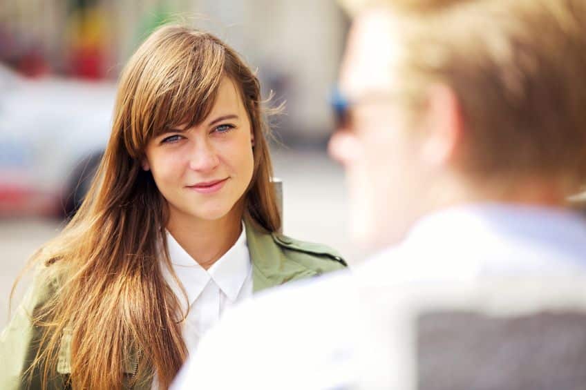 A woman staring on a man