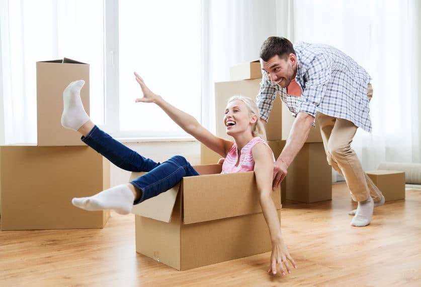 couple playing around with boxes