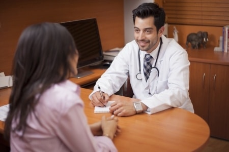 woman having a consulting a doctor