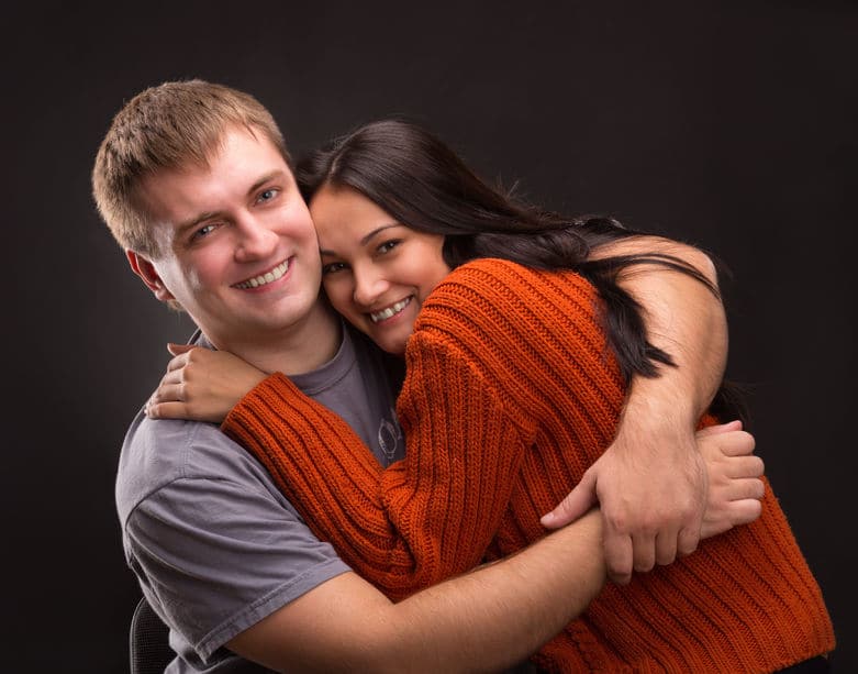 blonde guy with his ex girlfriend hugging each other