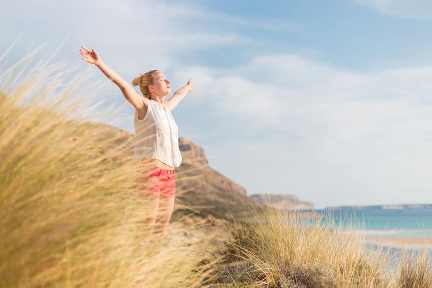 young free woman feeling the fresh air