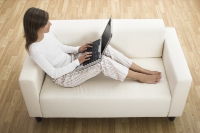 woman working at home with her laptop