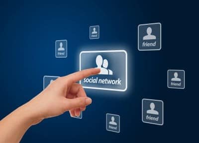 woman finger-pressing the social network icon