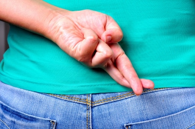 Woman with Crossed fingers