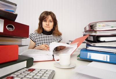 Female accountant busy working in the office