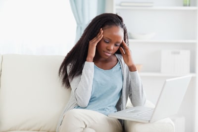 sad woman on the couch