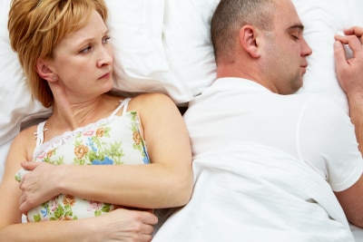 a couple on bed ending romance after the proposal