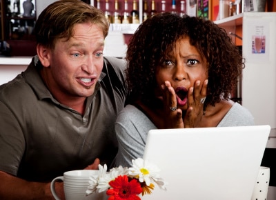 a man and a woman showing different reactions to online dating