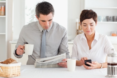 a working couple having breakfast together