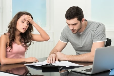 couple looking at their bills