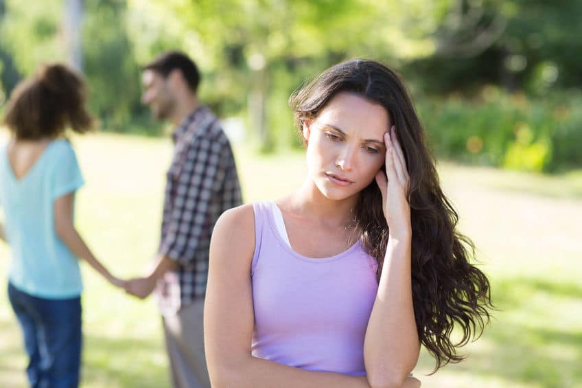 woman wearing pink rejected by a guy for other girl