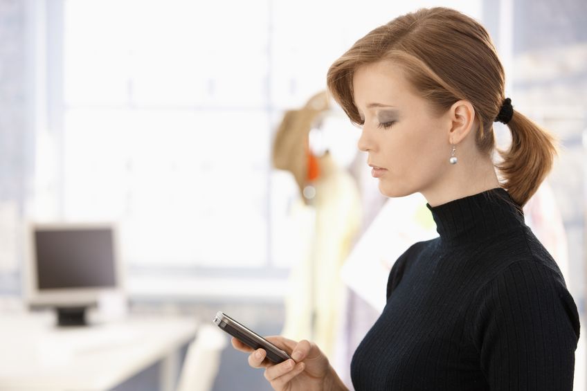 young woman using mobile phone