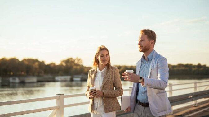 two couple walking and talking about getting engage