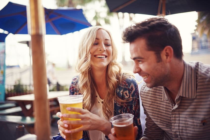 two sweet couple drinking together