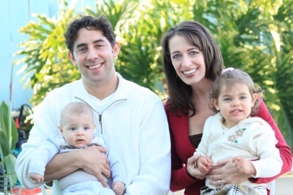 Evan Marc Katz and his wife holding their 2 young kids