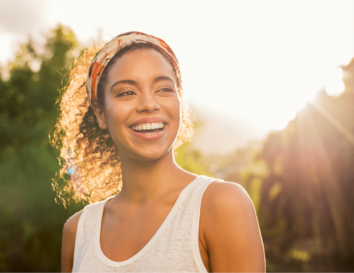 smart strong successful woman with curly hair smiling