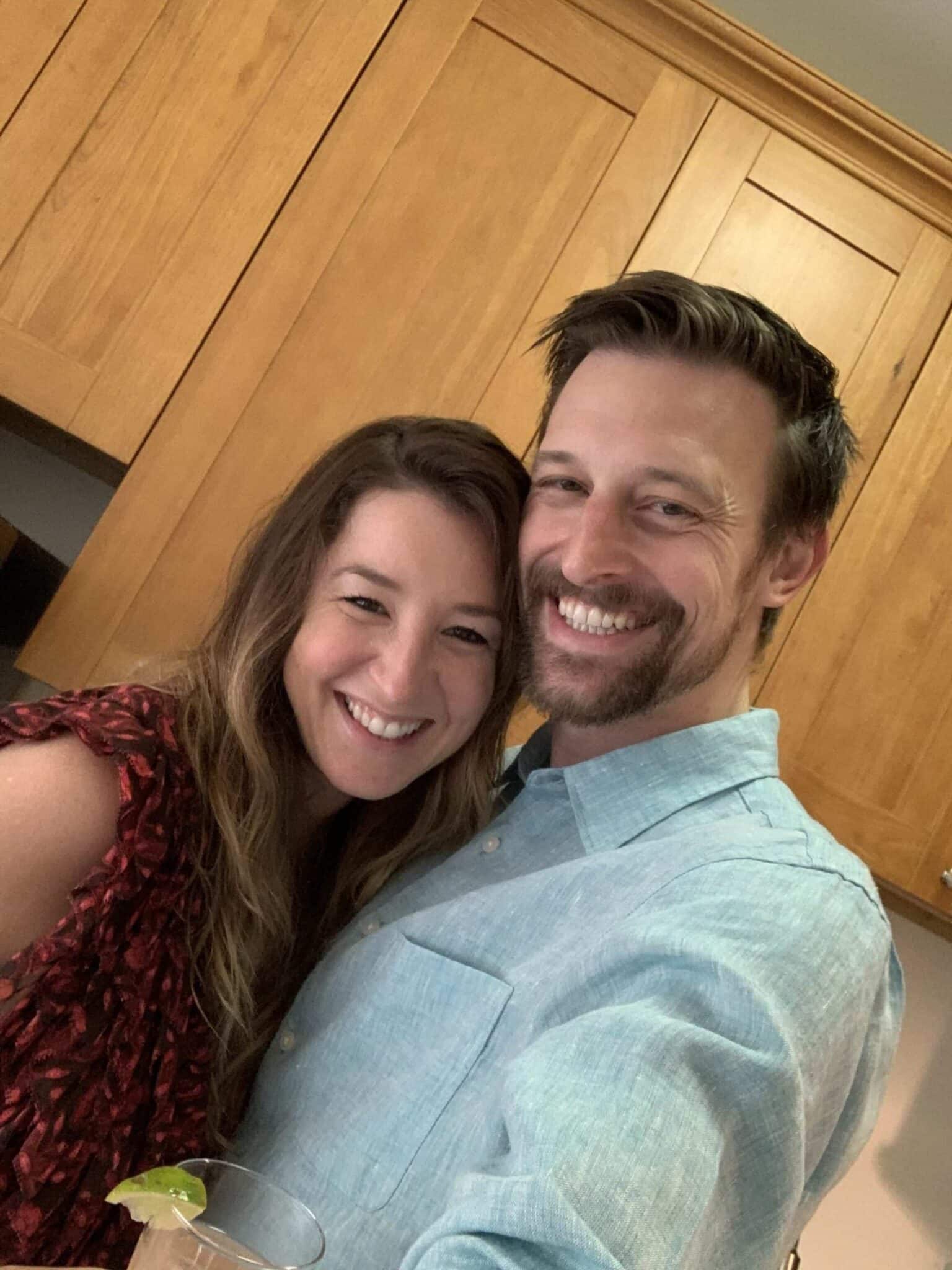 happy, young couple in their kitchen