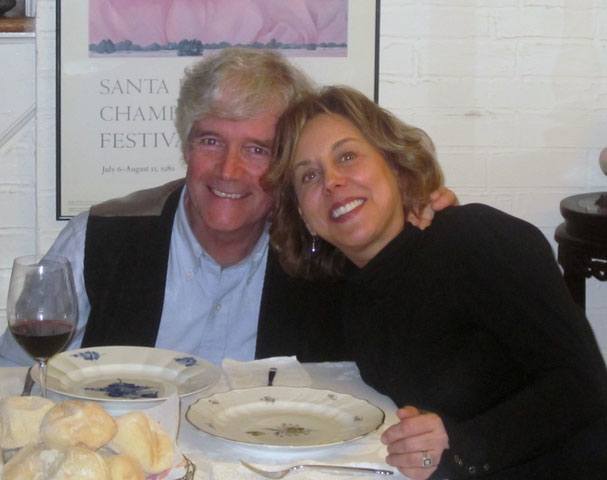 an elder couple having dinner together